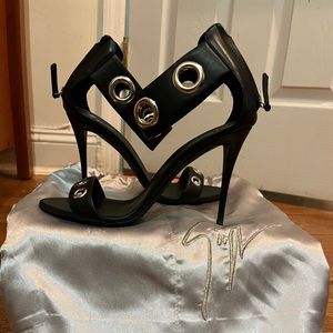 Brand new Giuseppe Zanotti sandals. Grommets, beautiful black leather